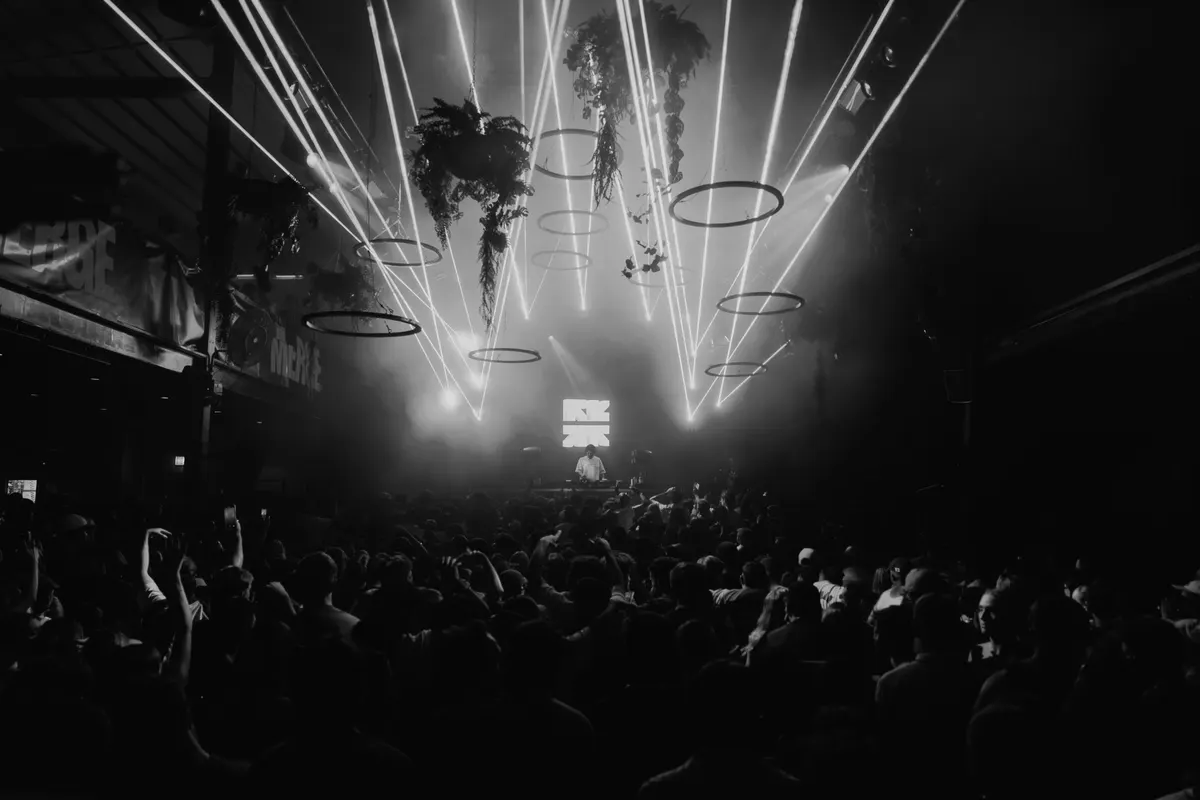 Merge crowd under the lights